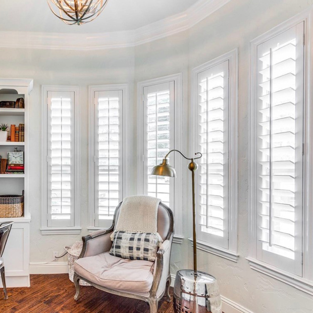 Home office with white polywood shutters