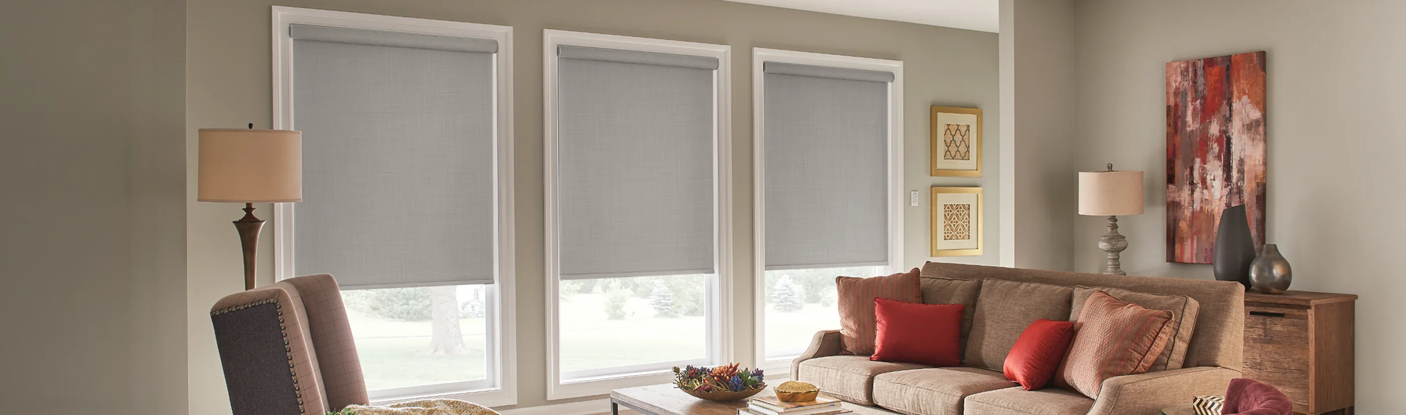 grey shades in a large living room decorated with red and beige