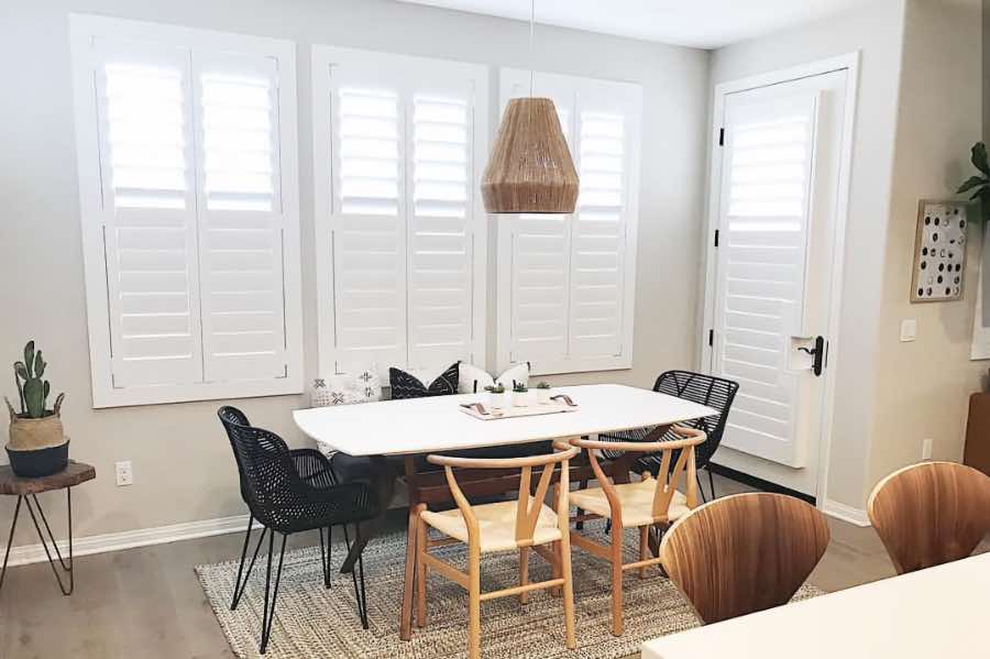 Use Polywood shutters to control natural light levels in your Phoenix dining room. Polywood shutters with top louvers tilted open in a dining room
