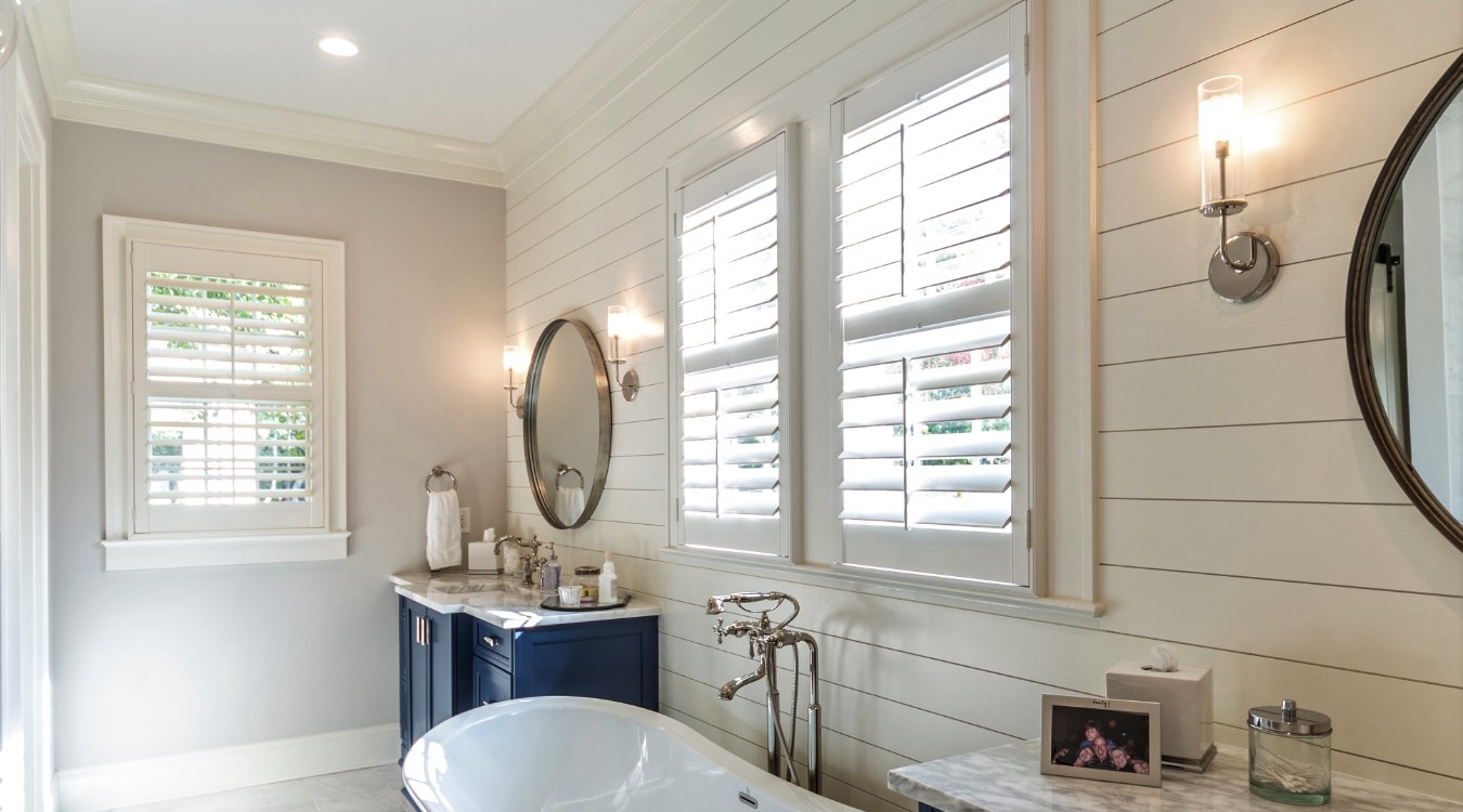 Phoenix bathroom with white plantation shutters.