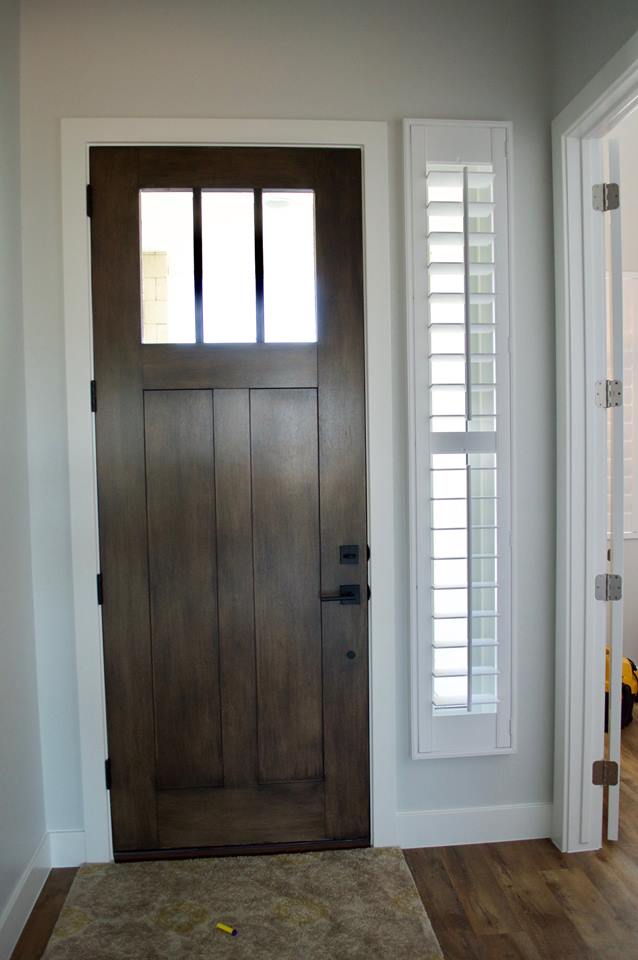 Plantation shutters on a front door