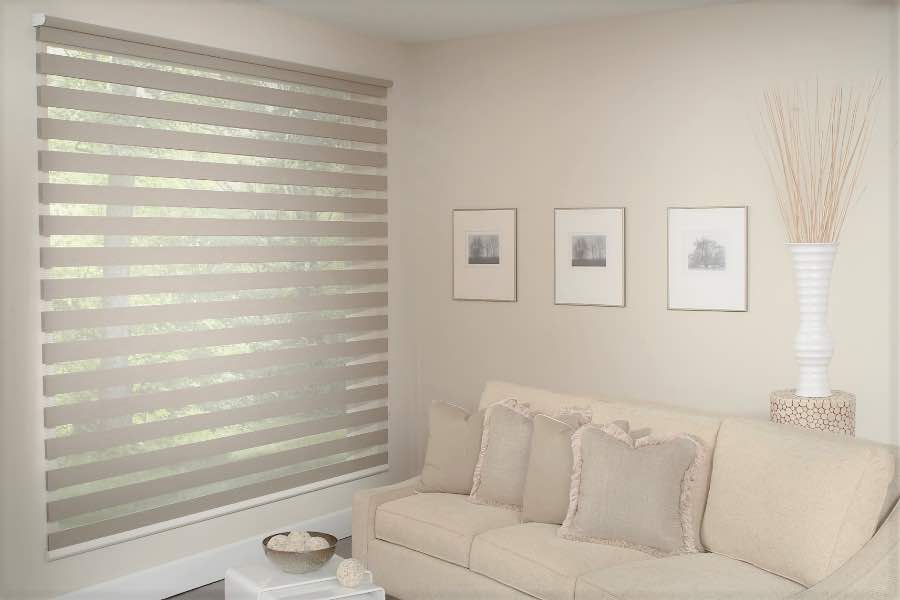 Zebra shades give you a unique combination of light control and style that benefits your Phoenix home. Zebra shade allows filtered light into a living room