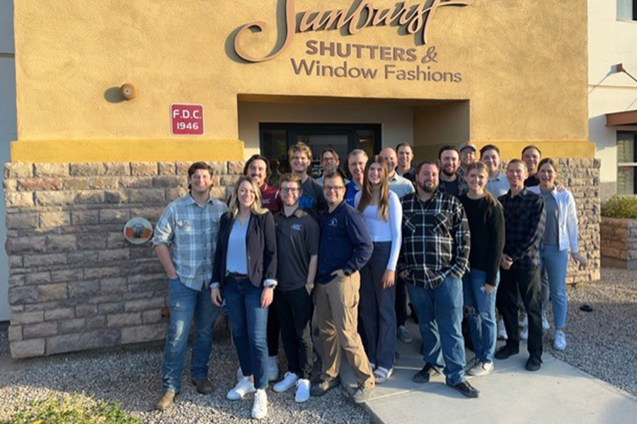 Our Phoenix team is ready to help you find the perfect Shutters, Shades, or Blinds for your home. Arizona team in front of Sunburst storefront