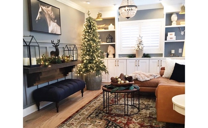 If your chairs, couches, and tables are beginning to show their age, the holidays are the perfect time to find replacements. Living room with horse painting and plantation shutters.