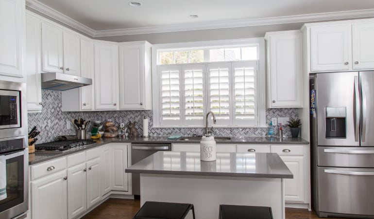 Polywood® plantation shutters resist heat and moisture in your kitchen. Polywood shutters in a Phoenix gourmet kitchen.