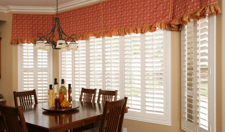 Decorative accents, drapes, and curtains may not reflect the simplistic style you want. Plantation shutters in Phoenix dining room.